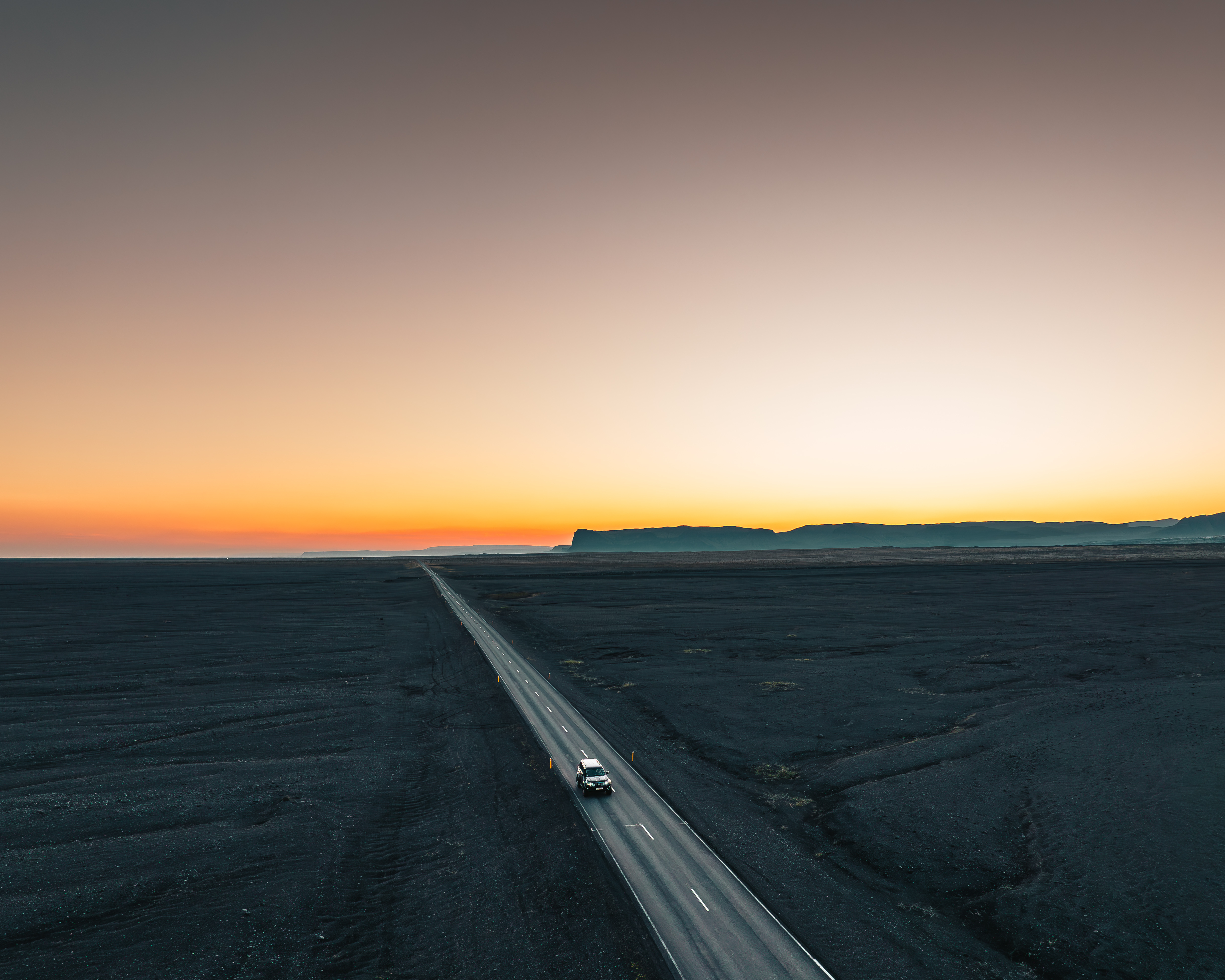 A Toyota Land Cruiser during sunset on the Icelands Ring Road.